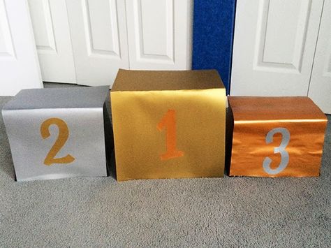 My Birthday Post, Diy Medal, Pep Rally Themes, Olympic Party Decorations, Vbs Olympics, Sport Themed Crafts, Medal Stand, Olympic Podium, Olympic Theme Party