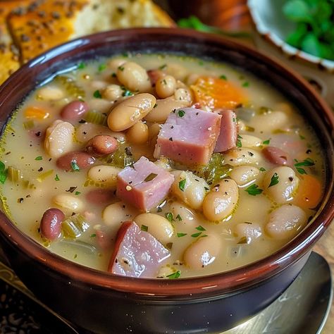 How to Make Delicious Ham and Bean Soup At Home – Charm Recipes Easy Ham And Bean Soup Crockpot, Old Fashioned Ham And Bean Soup, Dutch Oven Ham And Bean Soup, Ham Beans Soup, Bean Soup Recipes With Ham Bone, Ham N Bean Soup, Instapot Bean Soup, Meaty Soup Recipes, Ham N Beans