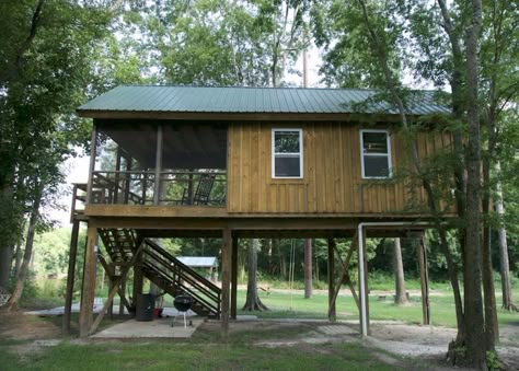 8000-dollar-riverfront-cabin-17 River House On Stilts, Raised Tiny House, Tiny House On Stilts Plans, Cabin On Stilts House Plans, Stilt Cabin, Small Cabin On Stilts, Lake Cabin Plans, Riverfront Cabin, Elevated Cabin