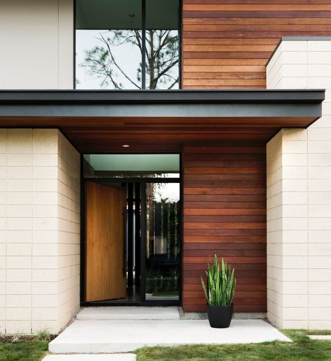 Photo 7 of 11 in A Houston Doctor’s Health-Focused Home Banishes Toxins and Braces for Storms - Dwell Concrete Block Walls, Hardwood Decking, Ipe Wood, Wood Siding, Exterior Wood, Concrete Blocks, Design Within Reach, Braces, Modern Home