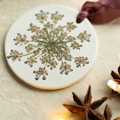 A handful of festive pressed flower ornaments have just been added to my website, featuring gorgeous snowdrops, ivy, mistletoe and Queen Anne’s Lace (these beauties remind me of snowflakes!). Each handmade ornament is unique and features flowers and foliage lovingly grown in my garden here in Worcestershire. 🤍🌲 #festivedecor #handmadewithlove #smallbusinessuk #ivy #mistletoe #snowdrop Small Business Uk, Hand Dyed Silk Ribbon, Flower Ornaments, Hand Dyed Silk, Pressed Flower, Handmade Ornaments, Queen Anne, My Garden, Silk Ribbon