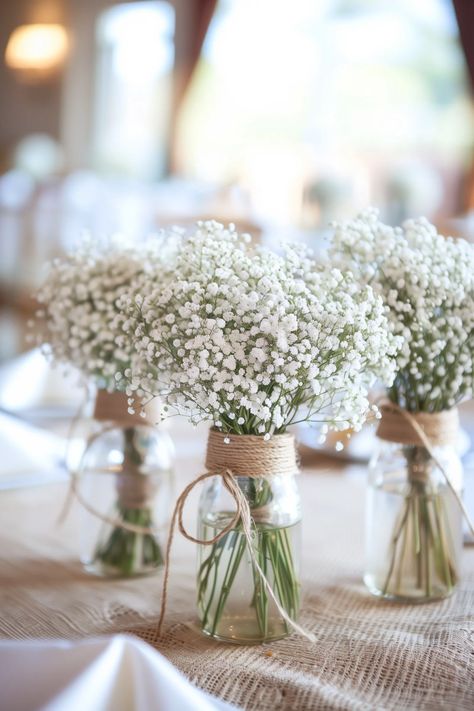 Using Mason Jar Centerpieces to Add Color to Your Table Settings Simple Top Table Decoration, Easy Diy Centerpieces Wedding, Diy Bridal Shower Centerpieces, Jar Centerpiece Wedding, Diy Wedding Centerpiece, Mason Jar Flower Arrangements, Wedding Table Decor Ideas, Wedding Centerpieces Mason Jars, Mason Jar Lights