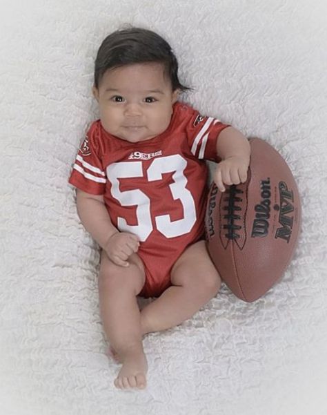 Football Milestone Pictures, Baby Football Photoshoot, Football Baby Photoshoot, Baby Football Pictures, Three Month Baby, Newborn Football, Monthly Photoshoot, Baby Football, 4 Month Old Baby