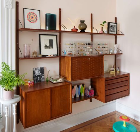 The Insider: Color-Loving Family Gives Prospect Heights Row House a Bold Makeover | Brownstoner Bay Window Nook, Mid Century Shelving, Rainbow Walls, Rainbow Bedroom, Brooklyn Brownstone, Teak Wall, Dining Table Black, Leather Ottoman, Main Bedroom