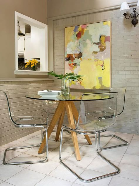 Using clear chairs or a glass-top table can make any space seem bigger: http://www.bhg.com/decorating/small-spaces/strategies/ideas-to-steal-for-your-apartment/?socsrc=bhgpin02042014cozychicdining&page=12 Glass Table, Table And Chairs, Dining Table, Apartment, Glass