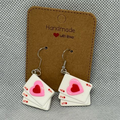 These Are Handmade By Me Heart Playing Card Earrings. The Playing Cards Are A Little Over An Inch High And A Little Over An Inch Wide. Please Refer To Photos For More Accurate Measurements And Sizing. The Earrings Are Made Out Of Hypoallergenic Iron And Resin. They Feature A Rubber Stopper On The Back. Please Refer To The Video To See All Of The Beautiful Details Of These Earrings. Earrings Contain Small Parts May Be A Choking Hazard. Heart Playing Card, Iron And Resin, Card Earrings, Trip To Vegas, Hearts Playing Cards, Cottagecore Jewelry, Horseshoe Earrings, Tree Of Life Earrings, Funky Earrings