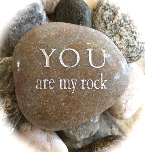 "Perfect or Graduation gift! *Please note - this listing is for the exact engraving you see in the photos (customized engraving is not available.) Our polished river rocks have natural imperfections that are characteristic of all natural stone. The colors, shapes, and sizes of our stones (2.5\" - 4.0\") vary. While we do put careful attention into making sure each of our word stones is beautiful, they are not guaranteed to be the exact colors and shapes as pictured. Engraved messages are enhance You Are My Rock Quotes, You Are My Rock Quotes Love, You Rock Quotes Inspiration, Rock Messages Ideas, Quotes About Rocks, Rock Collector Quotes, God Crafts, You Are My Rock, Rock Quotes