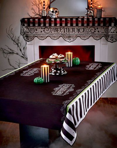 Transform your table with this officially licensed Beetlejuice Tablecloth! This tablecloth has BJ's signature stripes so there will be no doubting your inspiration from the ghost with the most. Officially Licensed Dimensions: 54" H x 108" W Material: Polyethylene Vinyl Acetate Care: Spot clean Imported Beetlejuice Party, Disney Baby Costumes, Halloween Beetlejuice, Creepy Home Decor, Striped Tablecloth, Reaper Costume, Light Up Costumes, Spider Web Decoration, Beetlejuice Halloween