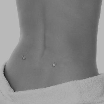 Piercings Body Ideas, Back Dimples Aesthetic, Lower Back Piercings, Back Piercings Dimples, Lower Back Dermal Piercing, Tongue Piercing Aesthetic, Chest Dermal, Back Dermals, Back Dermal Piercing