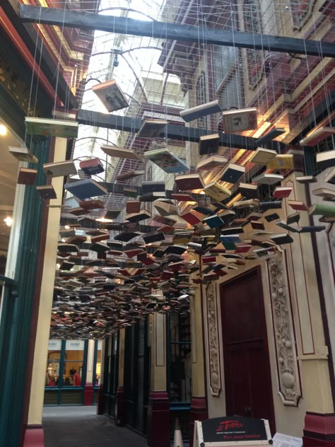 Hanging books. The City, London UK Book Chandelier, Hanging Books, Book Installation, Illusion Photos, Book Centerpieces, Book Art Sculptures, Library Book Displays, Bookstore Cafe, Fantasy Furniture