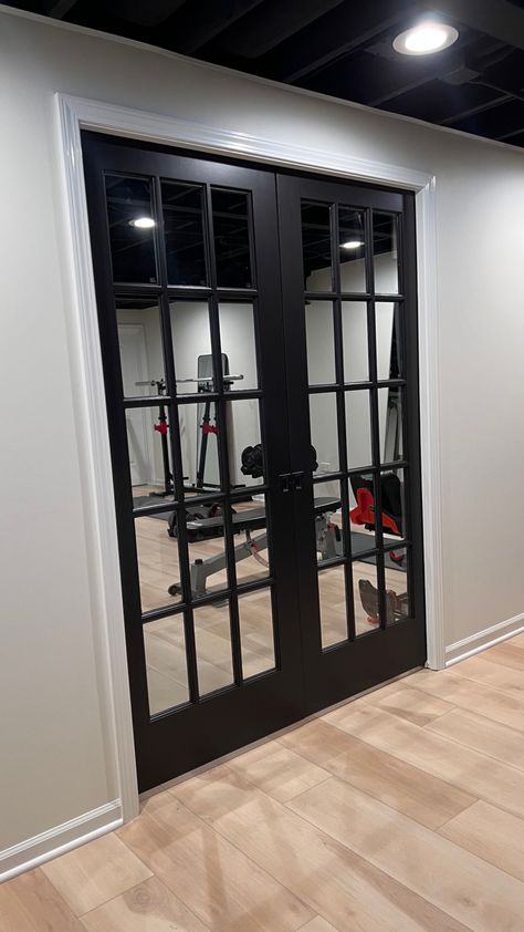 Gym French Doors, Black Door Basement, French Doors Basement, French Doors In Basement, Black Doors In Basement, Basement Gym Doors, Gym Door Design, Salon Door Design, Basement French Doors