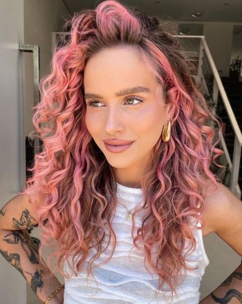 Sunrise Pink Face-Framing Highlights for Brown Curls Curly Pastel Hair, Naturally Curly Hair Color Ideas, Curly Pink Highlights, Baby Pink Highlights In Brown Hair, Pastel Pink Curly Hair, Light Pink Curly Hair, Peachy Hair Color, Curly Pink Hair, Pink Curly Hair