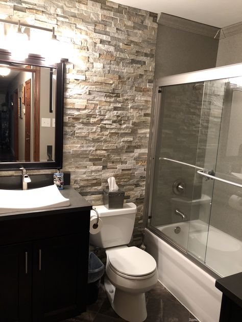 Ledger stone accent wall Stone Wallpaper Bathroom, Bathroom Rock Walls, Bathroom With Rock Wall, Rock Wall Bathroom, Bathroom Wallpaper Ideas Accent Wall, Stone Wall Bathroom, Stand Up Shower Remodel, Stone Bathroom Wall, Bathroom Rock