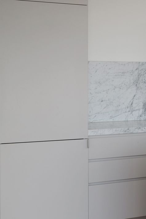 Laminex Oyster Grey cabinets pair well with a marble benchtop and splashback. Design: Chris Connell | Cabinet Maker: Matt Clarke Kitchen & Design | Photography: Willem-Dirk du Toit Oyster Grey Laminex Kitchen, Polytec Oyster Grey Kitchen, Laminex Oyster Grey, Oyster Grey Kitchen Cabinets, Laminex Kitchen Australia, Oyster Grey Kitchen, Marble Benchtop Kitchen, Carrara Kitchen, Latest Kitchen Ideas