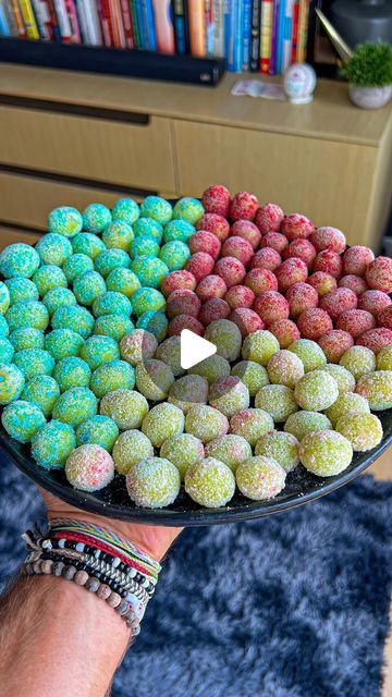 Zach Rocheleau on Instagram: "😋 291 Cal WHOLE Plate Sour Candy Grapes  📍 Been seeing this company called Fruit Riot going viral for their sour candy grapes you can buy at the stores. Have not been able to find them yet to actually give a review BUT I have been making low calorie sour candy grapes at home for years so wanted to share my recipe!  ✅ Macros for the WHOLE Batch Sour Candy Grapes: 291 Cals, 72g Carbs, 1g Fat, 4g Protein  ✳️ Ingredients: 400g Green Grapes Juice from 1 Lime ½ Box Starburst Blue Raspberry Sugar Free Jello Mix ½ Box Starburst Cherry Sugar Free Jello Mix ½ Box Starburst Pink Starburst Sugar Free Jello Mix  ❇️ Directions: 1️⃣ Wash your green grapes and add to a bowl. 2️⃣ Add the juice of 1 limes to the grapes and make sure they are all coated. 3️⃣ Then add half a pa Koolaid Grapes Recipe, Sour Gushers Recipe, Candy Grapes Recipes Jello, Jello Grapes Frozen, Sour Grapes Recipe, Candy Coated Grapes, Candy Grapes Recipes, Viral Snacks, Sour Candy Grapes