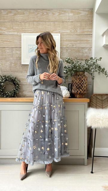 Sammy Duder 💙 on Instagram: "<< If you’re not one for a full on sparkly festive look then Tulle is always another option. I love to wear mine with a matching tonal knit which creates a much more effortless look with the added bonus of keeping you nice and warm! #winning >> Outfit 1 Grey knit @thewhitecompany Star tulle @woowooboutique Outfit 2 Tulle @southoftheriver.co.uk (afew years old) Knit @marksandspencer Outfit 3 Black tulle @southoftheriver.co.uk (afew years old) Black knit @massimod Tulle Skirt Sweater Outfit, Gray Tulle Skirt Outfit, Midi Tulle Skirt Outfit, Tulle Skirt Outfit Winter, Chiffon Skirt Outfit, Skirt With Sweater Outfit, Tonal Outfits, Flamingo Clothes, Grey Tulle Skirt