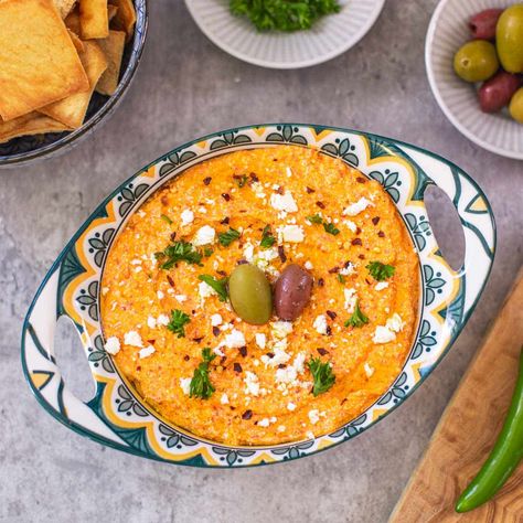 Tirokafteri (Greek Feta Dip) Tirokafteri Recipe, Greek Feta Dip, Spicy Feta Dip, Spicy Feta, Baguette Slices, Greek Dip, Homemade Pita, Homemade Pita Bread, Feta Dip