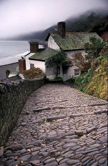 Cobblestone Steps, Clovelly, Devon, England photo via rose Cobblestone Road, Cottage By The Sea, English Village, Devon England, Body Of Water, England And Scotland, English Cottage, Fishing Villages, England Uk