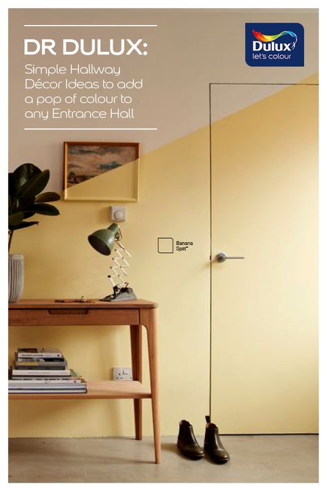 Add a splash of yellow to your hallway decor with a two tone paint effect. Hallway Ideas Yellow, Yellow Hallway Ideas Entryway, Pale Yellow Hallway, House Passage Interior, Half Painted Wall Hallway, Yellow Hallway Ideas, Delux Paint, Hall Paint Colors, Hallway Grey