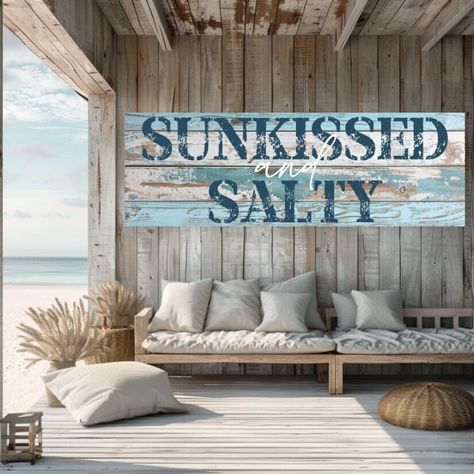 Introducing our Weathered Sunkissed and Salty Canvas Art, a perfect addition to coastal living room decor that embodies beachy wall decor with its distressed beach art aesthetic and rustic charm. This piece features a unique design that captures the essence of coastal living with weathered textures and the phrase Weathered Sunkissed and Salty, set against a backdrop of distressed wood. Printed on premium canvas, it enhances the distressed beach art effect and ensures durability. Ideal for beach- Coastal Accent Walls, Room Decor Beachy, Beach Theme Home, Beachy Wall Decor, Coastal Living Room Decor, Beachy Cottage, Beachy Living Room, Cozy Beach House, Salon Designs