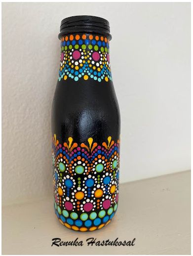 Again one more dot painting on bottle as a gift for a friend. Leave acomment if u like it Mandala On Glass Bottle, Mandala Painting On Bottles, Mandala Art Bottle Design, Bottle Dot Mandala, Dot Bottle Painting, Bottle Dot Art, Dot Art On Bottles, Dot Mandala On Bottle, Mandala Dot Painting On Bottle