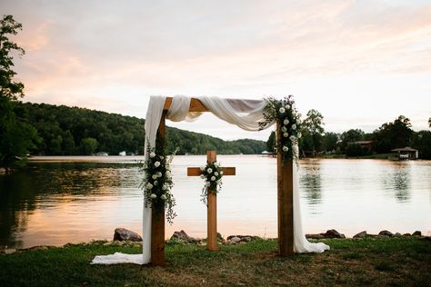 Cross Arbor Wedding, Cross Arbor, Backyard Lake, Wood Arbor, Arbor Wedding, Flowers And Greenery, Handmade Wood, Arbor, Outdoor Wedding