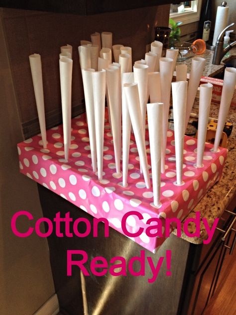 Cotton candy stand. -cake box from party store, wrapped in paper, poke holes with screwdriver. Cotton Candy Stand Diy, Cotton Candy Holder Stand Diy, Cotton Candy Holder Stand, Cotton Candy Display Stand, Cotton Candy Stand Display Diy, Cotton Candy Holder, Cotton Candy Display, Spring Festival Ideas, Candy Holder Diy