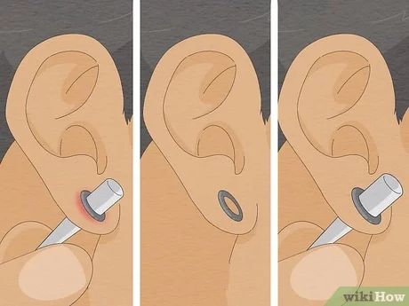 How to Stretch Your Ears Pain Free: 11 Steps (with Pictures) How To Stretch Ears, Ear Stretching Guide, How To Stretch Your Ears Gauges, Ear Stretching Sizes, Ear Stretching Aesthetic, Ear Stretching, 4g Ear Stretch, Stretching Ear Lobes, How To Stretch Ears Safely