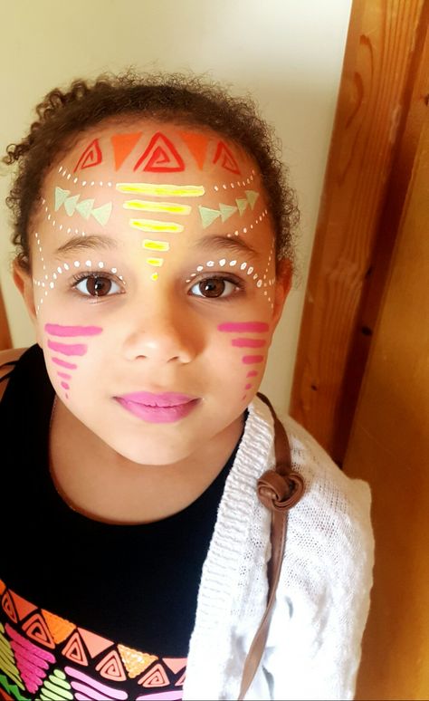 Aztec face painting. Tribal face painting. Can be used for adults or children. My daughter wanted her face paint to match her top. It was quick easy and fun. Festival face painting. Face painting by chantelle hallett. Aztec Face Paint, Pintura Facial Neon, Festival Face Painting, Indian Face Paints, Glow Face Paint, African Face Paint, Native American Face Paint, Neon Face Paint, Festival Face Paint