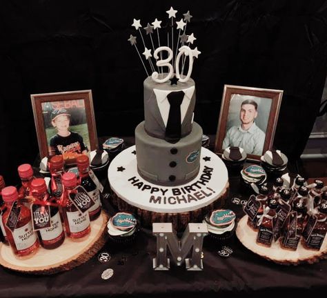 30th birthday cake table for him. Incorporated UF (University of Florida) Gators into a classy look for his cake. Cake and Favors on wood slices. Black, Gray and white themed. Guy Surprise Birthday Party, Dessert Table Ideas Birthday Men, 30th Birthday Dessert Table For Men, Guy 30th Birthday Cake, Jack Daniel’s Birthday Cake, Birthday Cake Quotes, Fancy Birthday Cakes, 30th Birthday For Him, Cake Table Backdrop