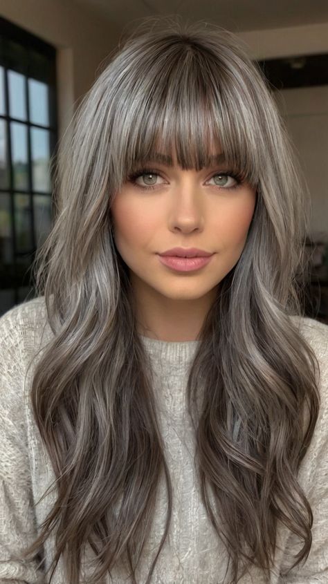 Effortless medium length gray Ideas for Soft Waves with Piecey Bangs ✨ Copper Gray Hair, Gray Violet Hair, Grey Blending Balayage Brunette, Dark Hair Grey Blending, Grey Hair Young Women, Gray Babylights, Gray Roots Blending, Brunette Gray Blending, Smoky Grey Hair