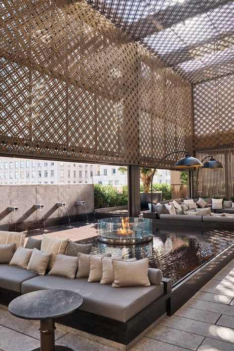 This Midtown Hotel Aims to Be an Oasis of Calm in New York City Outdoor Hotel Lounge, Hotel Patio Design, Hotel Rooftop Design, Mediterranean Hotel Lobby, City Hotel Architecture, Modern Hotel Design, Clubhouse Interior, Oasis Hotel, Boutique Hotel Lobby