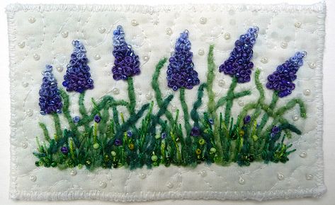 Grape Hyacinth Garden |  by Kirsten Chursinoff via Flickr ...... White background Hyacinth Embroidery, Hyacinth Garden, Hyacinths Garden, Embroidery Mending, Lace Cross Stitch, Spring Flower Crafts, Grape Hyacinth, Felted Flowers, Embroidery Blue