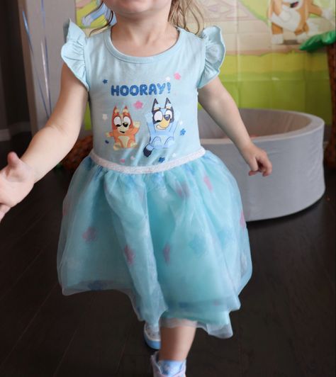 Toddler girl wearing a blue bluey knee length dress dress. Dress says hooray and has blue and bing and pink and blue stars. Bluey And Bingo Costume, Bluey And Bingo, Bluey Bingo, Bluey Birthday, Toddler Party Dress, Packing A Cooler, Designer Jumpsuits, Swimsuit Set, Blue Hoodie