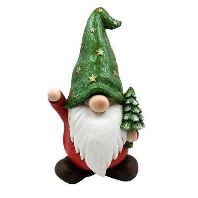 Who needs elves when you can have Christmas Gnomes?! "The good fellows" are a collection of six assorted gnome garden statues, each wearing Christmas garments and hats and engaged in holiday activities like opening presents. Crafted from durable magnesium, each gnome is hand painted with special attention to details, patterns, and textures. They all have classic white beards and oversized pointy hats, looking especially cute with their large round nose and eyes covered. | The Holiday Aisle® Gard