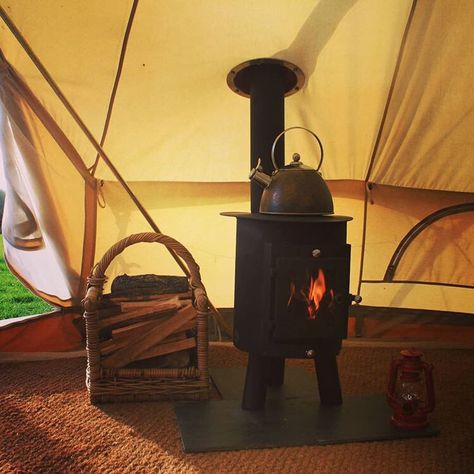 The Outbacker Hyggebell tent wood burning stove is the latest addition to the Outbacker family allowing you to camp even in colder weather. Read on to find out more.  Taken from the Danish word for snug the Hyyge offers a practical solution for longer camping trips or for fitting into cabins or sheds. The Hygge stove offers campers a durable yet portable stove solution.  Amazingly this stove offers over 4.5Kw of heat but the stove body weighs only 18kg. Alongside its beautiful curves the stove i Tent Footprint, Bell Tents, Glamping Tents, Inner Tents, Portable Stove, Tent Stove, Canvas Tent, Stove Accessories, Bell Tent