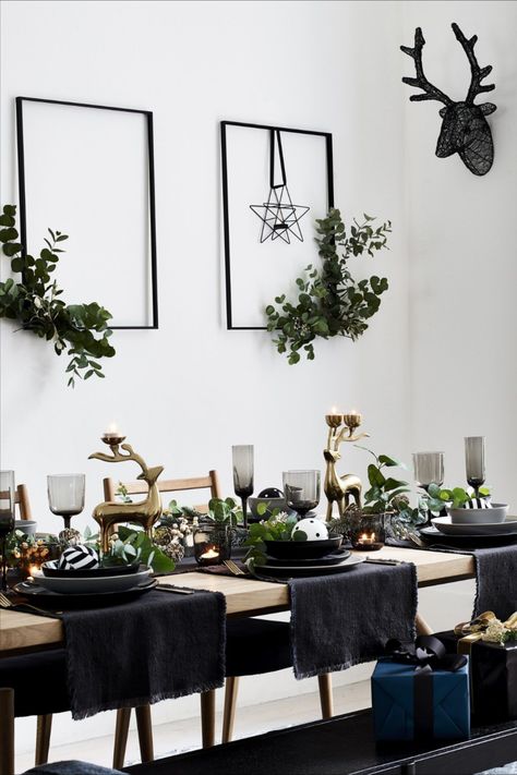 Don’t be afraid of dark colours when decorating your Christmas table. Try using black table mats or runners laid across the width of the table rather than a traditional tablecloth to keep it minimal. Contrast the darker shades with some gold highlights using candle holders or in the centrepiece for an elegant finish #homedecor #interiordesign #Christmasdecor Image: Debenhams Black Christmas Decorations, Christmas Interiors, White Christmas Decor, Christmas Black, Christmas Inspo, Christmas Dining, Black Table, Christmas Table Settings, Black Christmas