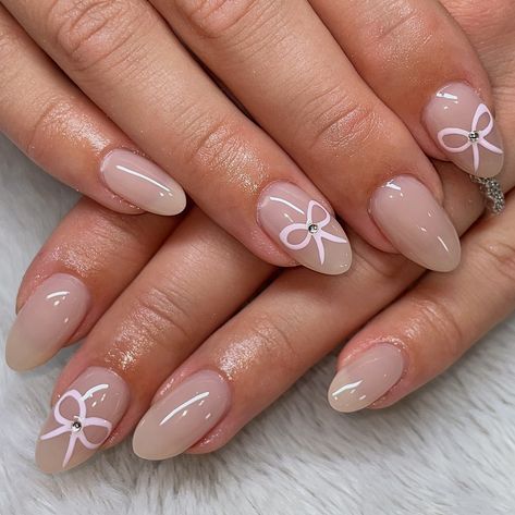 tiny little bows 🎀🤍 gel fill w/ nail art done on @kaitlynmoorcroft <3 @cndworld @cndpro.na - cnd plexigel builder clear @dndgel @dndgel.europe - dc 132 lemon tea - dc 056 white chalk - dnd 871 how do u neutral? #bownails #bownails🎀 #bownailart #coquettenails #coquettenailart #coquetteaesthetic #lanadelreynails #girlynails #almondnails #pinterestnails #gelnails #geloverlaynails #ontariocanada #cnd #cndplexigel #dndgel #dndgelpolish #nailpromagazine #nailsmagazine #nailitmedia #showscratch Bloom Nails, Gel Overlay Nails, Bow Nail Art, Dnd Gel Polish, Lemon Tea, White Chalk, Nail Pro, Nails Inspo, Nails Magazine