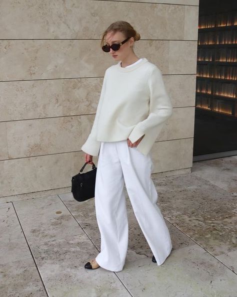 Iris | Outfit inspiration on Instagram: "White outfits hit different 🤍 Jumper: @wakakuuicons Trousers: @karen_millen * Shoes: @chanelofficial * Bag: @burkely * Sunglasses: @celine #whiteoutfit #whitetrousers #scandinavianfashion #scandifashion #beigeaesthetic #parisification #minimalistwardrobe #outfitdujour #minimalstyleblogger #theparisianchique #capsulecloset #capsulecollection #parisianamour #capsule #simplefits #autumnoutfit #everydayfashion" White Tonal Outfit, Monochromatic White Outfit, White Trousers Outfit Winter, Monochromatic Outfit White, White Trousers Outfit Classy, White Monochromatic Outfit, White Trousers Outfit, Sunglasses Celine, Scandi Fashion