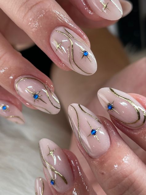 Too beautiful not to stare ✨ . . . . #nails #nailart #nailsnailsnails #nailinspo #nudenails #elegantnails #chrome #chromenails #blue #shortnails #acrylicnails #almondnails #ovalnails #elegantnails #weddingnails #cutenails #beautifulnails #starnails #summernails #goldnails #mnnails #mnnailtech #minnesotanails #minnesotanailtech #minneapolisnails #minneapolisnailtech #nailsofinstagram #instagramnails #fashion Gold Chrome Oval Nails, Greek Nails Blue, Greek Inspired Nail Art, Blue Nails With Gold Design, Office Siren Nails, Ethereal Nails Acrylic Almond, Ethereal Nail Design, Church Nails Designs, Blue Detail Nails