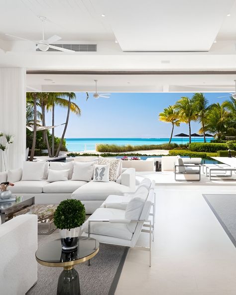 Floor-to-ceiling oceanfront views embrace you at this ultra-chic Turks & Caicos villa rental.  Designer details, beachside bliss - it's island living redefined.  Head here 🔗 Turks And Caicos Villas, Dream Villa, Oceanfront Vacation Rentals, Caribbean Luxury, Grace Bay, Island Villa, Turks Caicos, Caribbean Island, Modern Beach House