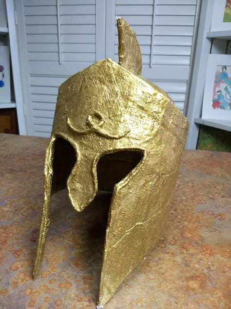 Studying Ancient Greece this year? Check out our Greek warrior's helmet. This is just one of our projects for Ancient Greece. Easy step-by-step streaming video art history that integrates with your history units. And did we mention fun?? It's time to Take Time for Art! www.taketimeforart.com #homeschoolart . #taketimeforart . #artcurriculum #homeschoolartcurriculum . #homeschooling Ancient Greece Art Projects, Ancient Greece Crafts, Ancient Greece Projects, Ancient Greece For Kids, Art History Books, Ancient Rome Projects, Ancient Greece Art, Greek Crafts, Greece Art