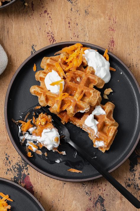 These Gluten-Free Carrot Cake Waffles come together in less than 30 minutes and they're very light and soft. Top with greek yogurt, honey, and walnuts. If you're looking for a good breakfast freezer meal, these waffles are perfect for you! They freeze well and they're great reheated in the toaster. #glutenfreewaffles #carrotcake Tastes like carrot cake but gluten-free and only sweetened with honey! Carrot Cake Waffles, Cake Waffles, Greek Yogurt Honey, Yogurt Honey, Greek Yogurt Pancakes, Yogurt Pancakes, Gluten Free Carrot Cake, Good Breakfast, Gluten Free Waffles