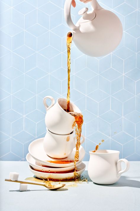 Tea Party Still Life Photography, Pouring Tea Illustration, Tea Photoshoot Ideas, Pouring Tea Reference, Surreal Product Photography, Tea Pot Pouring, Teapot Pouring Tea, Teapot Photography, Teapot Still Life