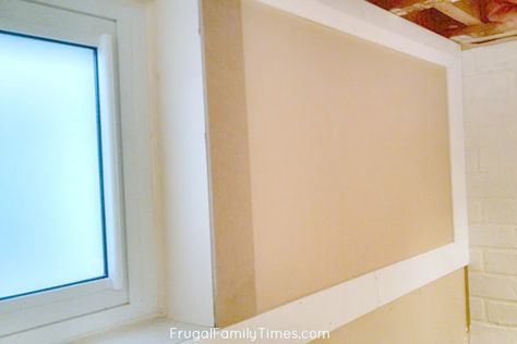 How to Make a Small High Basement Window Look Bigger (with Trim and Blinds!) | Frugal Family Times White Bedding Farmhouse, Sage Green Panelling, Fake Windows Basement, Bedroom Airy, Farmhouse Side Tables, Green Panelling, Basement Window Treatments, Basement Window, Wall Ledge