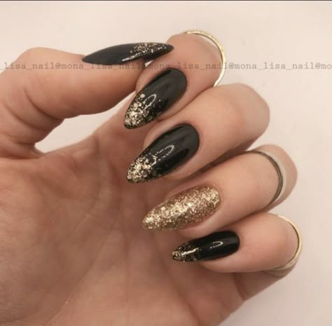 Almond Shaped Black And Gold Nails, Black And Gold Party Nails, Bronze And Black Nails, Black With Gold Glitter Nails, Black Gold Cat Eye Nails, Black Gold Nails Ideas, Classy Black And Gold Nails, Black And Gold Sparkly Nails, Black And Gold Coffin Nail Ideas