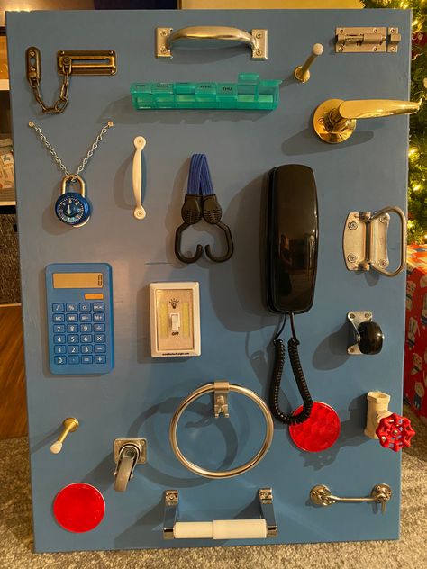 Homemade Toddler Busy Board with supplies from Menards, Amazon, & around the house. Lock And Key Busy Board, Toddler Busy Board Diy, Homemade Busy Board, Diy Busy Board Toddler, Busy Board Ideas, Diy Busy Board, Toddler Busy Board, Toddler Activity Board, Busy Board Baby