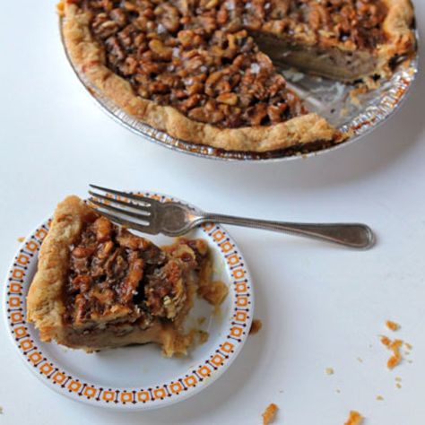 Walnut pie, oh my! A light sprinkle of sea salt adds a touch of depth to the light honey filling in this recipe. Thanksgiving Potluck Recipes, Holiday Potluck Recipes, Walnut Pie, Fall Pies, Honey Walnut, Sweet Pie, Potluck Recipes, Julia Child, Pie Dessert