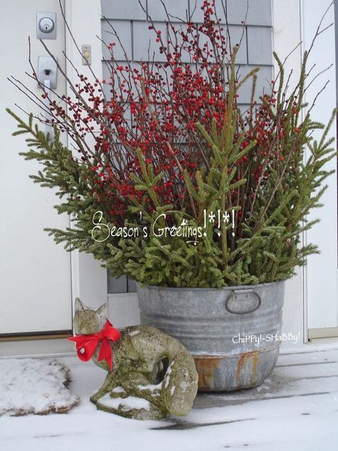 24 Colorful Outdoor Planters for Winter & Christmas Decorations - A Piece Of Rainbow Xmas Planter Ideas, Porch Pots For Christmas, Decorate Planters For Christmas, Whiskey Barrel Winter Decor, Outdoor Planters Winter, Easy Christmas Planters, Winter Porch Pots Christmas Arrangements, Planter Box Christmas Outdoor, Back Deck Christmas Decor