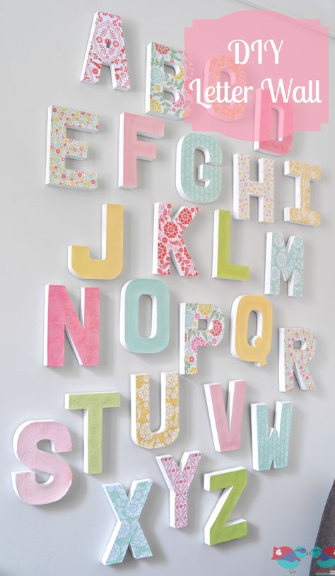 DIY Letter Wall - Make a big, colorful statement piece with an inexpensive home decor craft. {The Love Nerds} #letterdecor #modpodge #papermache #papercraft Diy Wall Letters, Mod Podge Projects, Letters Diy, Deco Pastel, Letter Wall Decor, Girls Playroom, Diy Wand, Letter Decor, Letter Wall Art